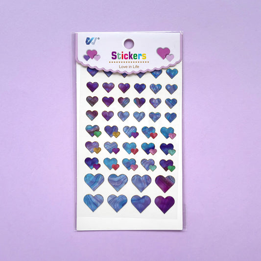 Stickers corazones iridiscentes azulados y morados con minicorazones