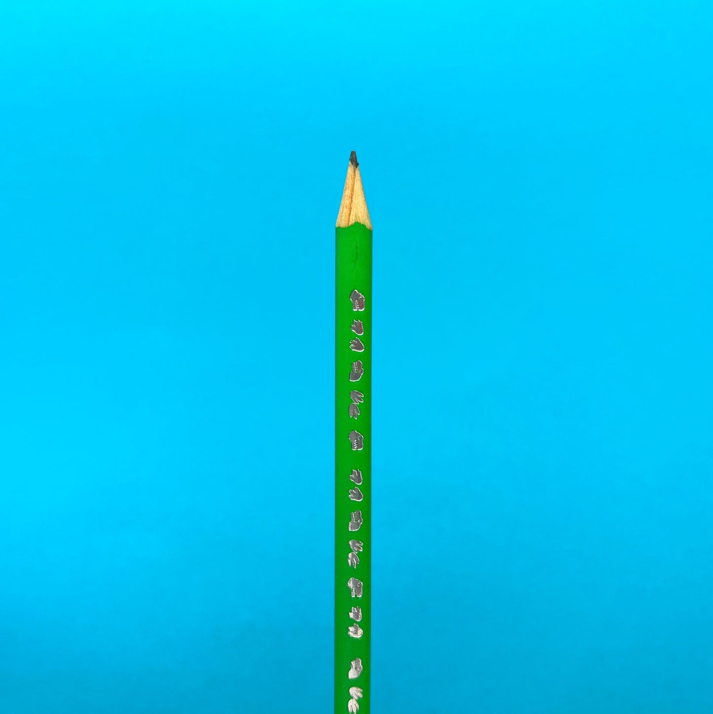 Lápiz negro de grafito dinosaurio x unidad