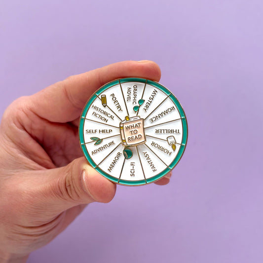 Pin metálico ruleta What to Read