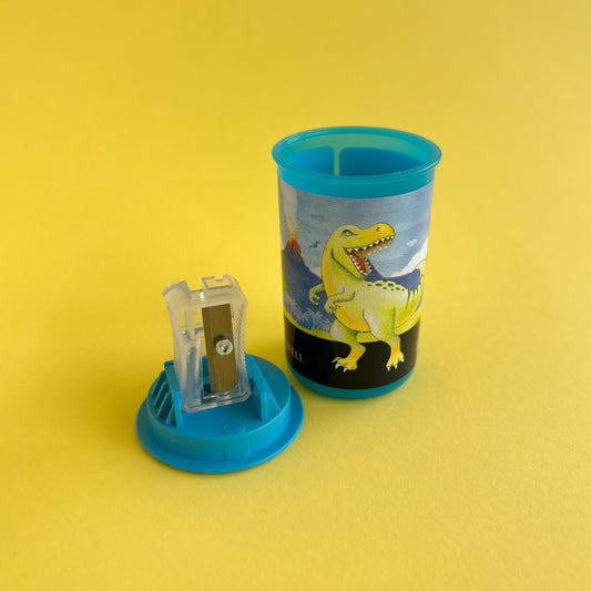 Tajalápiz con depósito dinosaurio x unidad - Verde y Azul